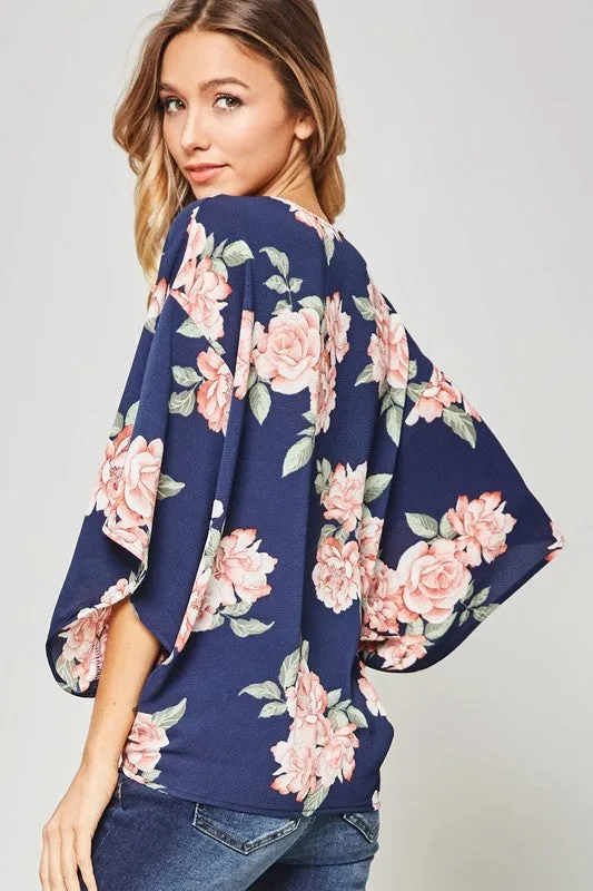 NEVER GETTING OLDER FLORAL TOP
