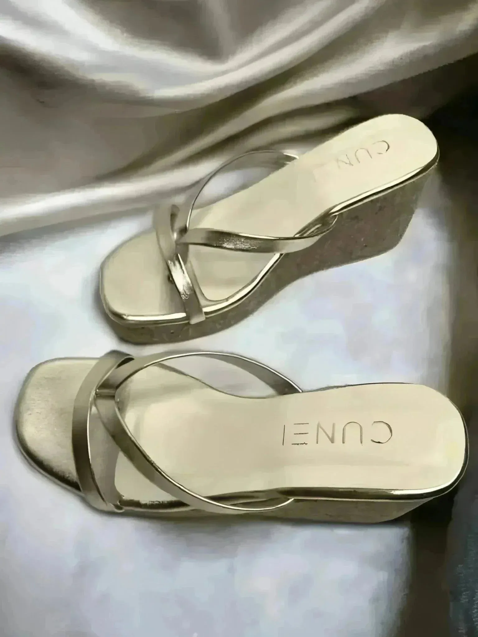Sleek and Stylish Golden Wedges