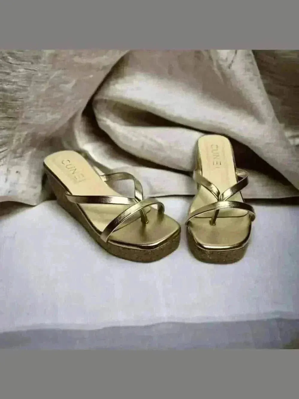 Sleek and Stylish Golden Wedges