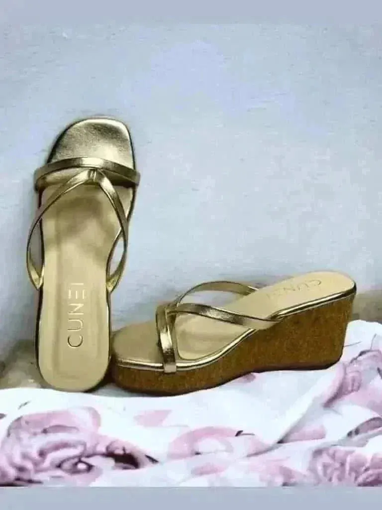 Sleek and Stylish Golden Wedges